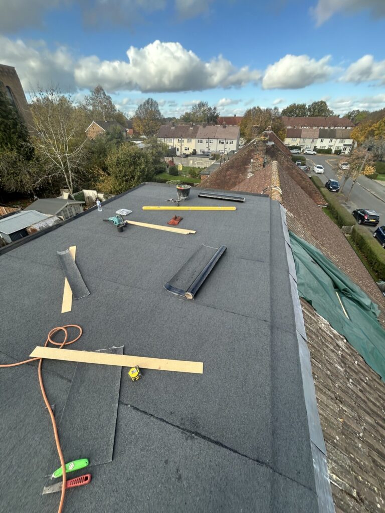 Flat roof installation on loft conversion with high-quality roofing materials, ensuring durability, weather protection, and a professional finish.