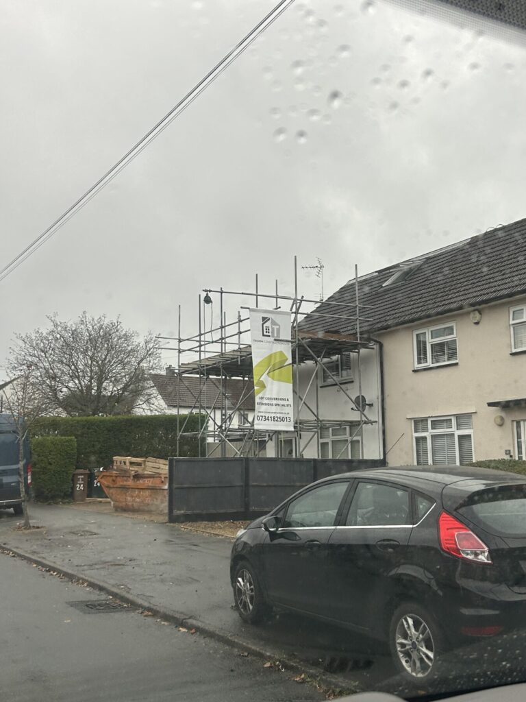 Residential loft conversion project with full scaffolding setup and site preparation, ensuring safe and efficient construction from the ground up.